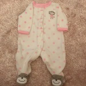 Fuzzy soft Carter’s newborn onesie with monkey feet